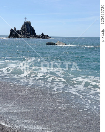 Asseu Rock in sea, Liguria. Nature and tourism of Italy, Europe. Ecology and clean air. Environmental protection.  125425720