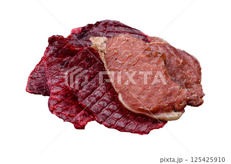Jerky, dried pork meat slices with salt and spices 125425910