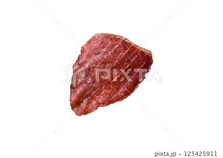 Jerky, dried pork meat slices with salt and spices 125425911