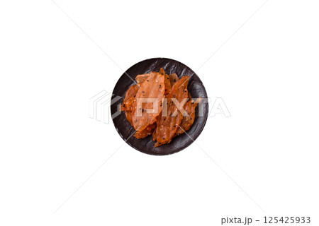 Jerky, dried chicken meat with salt and spices 125425933