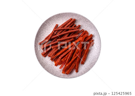 Jerky dried fish sticks with salt and spices Jerky dried fish sticks with salt and spices 125425965