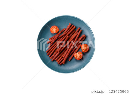 Jerky dried fish sticks with salt and spices Jerky dried fish sticks with salt and spices 125425966