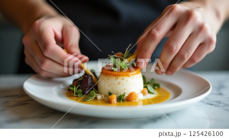 Chef plating dessert with herbs, candied vegetables, savory sauces, minimalist plate, creative and innovative food art 125426100