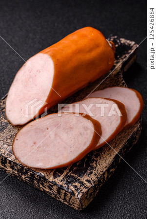 Delicious fresh boiled chicken or pork sausage cut into slices 125426884