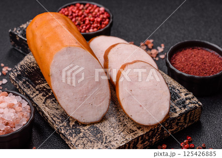 Delicious fresh boiled chicken or pork sausage cut into slices Delicious fresh boiled chicken or pork sausage cut into slices 125426885