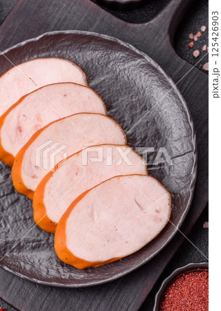 Delicious fresh boiled chicken or pork sausage cut into slices 125426903