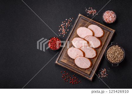 Delicious fresh boiled chicken or pork sausage cut into slices Delicious fresh boiled chicken or pork sausage cut into slices 125426910