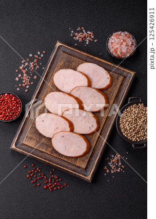 Delicious fresh boiled chicken or pork sausage cut into slices Delicious fresh boiled chicken or pork sausage cut into slices 125426911