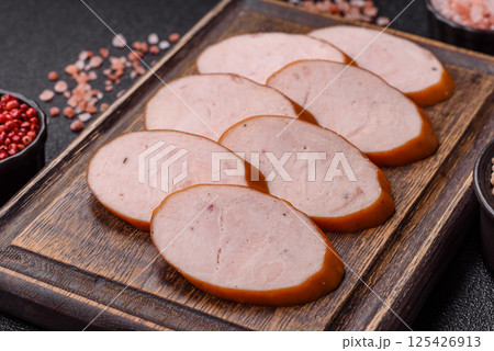 Delicious fresh boiled chicken or pork sausage cut into slices Delicious fresh boiled chicken or pork sausage cut into slices 125426913