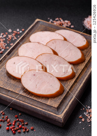 Delicious fresh boiled chicken or pork sausage cut into slices 125426916