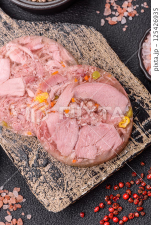 Homemade brawn with salt, spices, herbs and vegetables 125426935