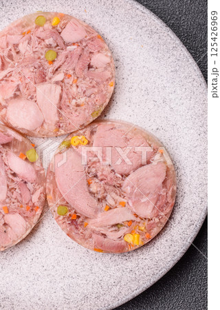 Homemade brawn with salt, spices, herbs and vegetables 125426969