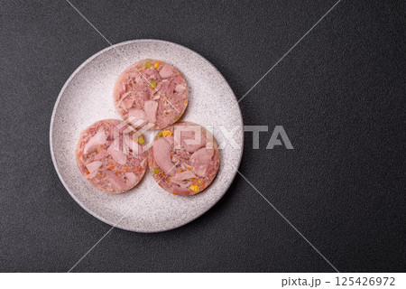 Homemade brawn with salt, spices, herbs and vegetables 125426972