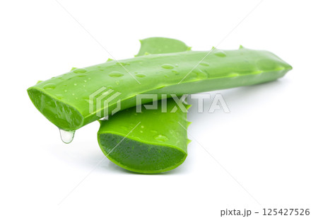 Aloe vera sliced with gel dripping isolated on white background 125427526