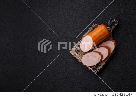 Delicious fresh boiled chicken or pork sausage cut into slices Delicious fresh boiled chicken or pork sausage cut into slices 125428147