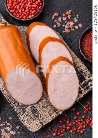 Delicious fresh boiled chicken or pork sausage cut into slices 125428156