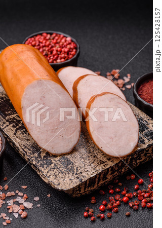 Delicious fresh boiled chicken or pork sausage cut into slices 125428157