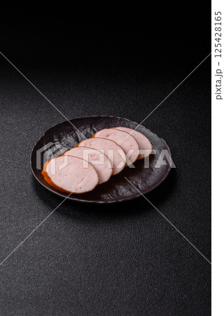 Delicious fresh boiled chicken or pork sausage cut into slices Delicious fresh boiled chicken or pork sausage cut into slices 125428165