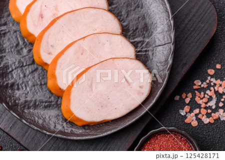 Delicious fresh boiled chicken or pork sausage cut into slices Delicious fresh boiled chicken or pork sausage cut into slices 125428171