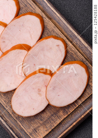 Delicious fresh boiled chicken or pork sausage cut into slices Delicious fresh boiled chicken or pork sausage cut into slices 125428188