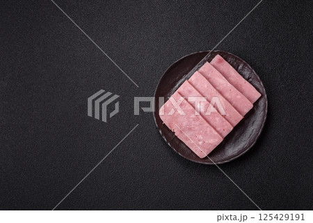 Delicious canned pink ham with salt, spices and herbs 125429191
