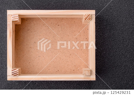 Empty wooden box for fruits or vegetables 125429231