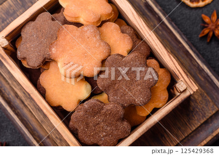 Ginger sweet cookies in yellow and brown color 125429368