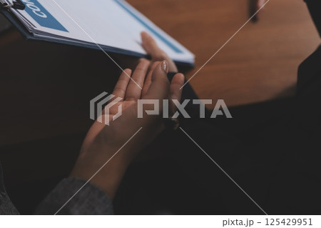 Judge gavel with Justice lawyers having team meeting at law firm background. Concepts of Law and Legal services. Judge gavel with Justice lawyers having team meeting at law firm background. Concepts of Law and Legal services. 125429951