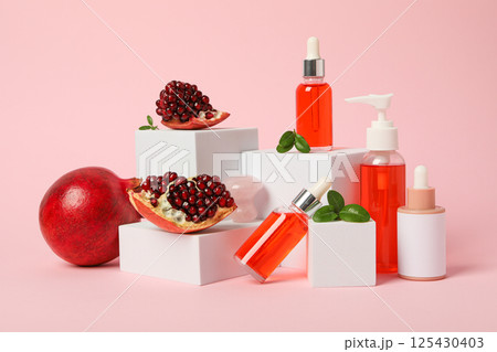 Self care and skincare products concept - pomegranate cosmetics 125430403
