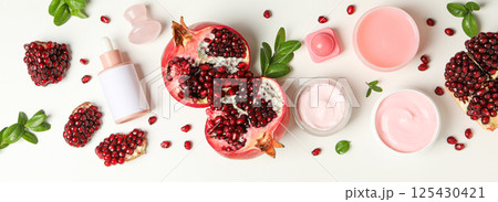 Self care and skincare products concept - pomegranate cosmetics 125430421