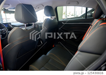 Interior of a modern car with black leather seats 125430816