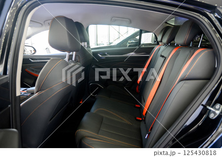 Interior of a modern car with black leather seats 125430818