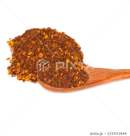 Chili powder pile isolated on white background Chili powder pile isolated on white background 125431644
