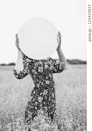 Mystery Woman Portrait with Round Mirror in the Wheat Field Mystery Woman Portrait with Round Mirror in the Wheat Field 125433037