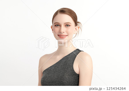 A beautiful young woman with clean, fresh skin against a white background. Skincare, facial treatment, cosmetology, beauty, and spa. An elegant portrait of an woman. A beautiful young woman with clean, fresh skin against a white background. Skincare, facial treatment, cosmetology, beauty, and spa. An elegant portrait of an woman. 125434264
