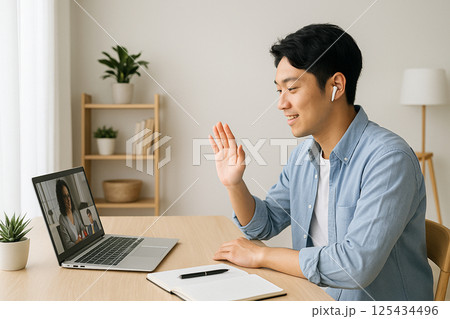 在宅リモート会議で挨拶する若手テレワーカー・ハイブリッドワーク 在宅リモート会議で挨拶する若手テレワーカー・ハイブリッドワーク 125434496