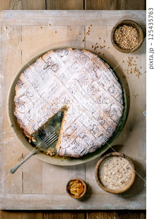Homemade Cake Pastiera Napolitano with Powdered Sugar Topping Homemade Cake Pastiera Napolitano with Powdered Sugar Topping 125435763