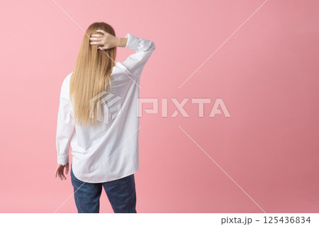 Anonymous Woman on Pink Backdrop Anonymous Woman on Pink Backdrop 125436834