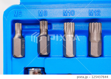 part of A set of single-sided chrome steel bits in a blue plastic box part of A set of single-sided chrome steel bits in a blue plastic box 125437644