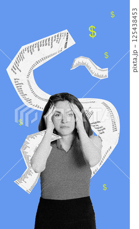 Stressed woman holds head surrounded by chaotic swirl of grocery receipts symbolizing crisis in living. Stressed woman holds head surrounded by chaotic swirl of grocery receipts symbolizing crisis in living. 125438453