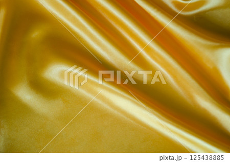 Yellow silky sheen suitable for design and wallpaper decoration 125438885