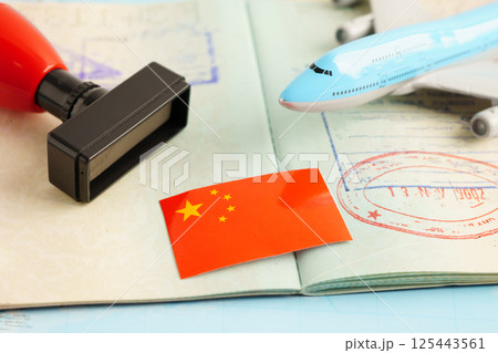 China passport with approved stamp on document for tourism. 125443561
