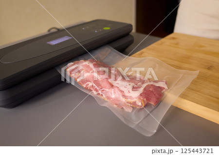 Using Vacuum Sealing Techniques for Enhancing Meat Freshness, Storage, and Preservation Benefits 125443721