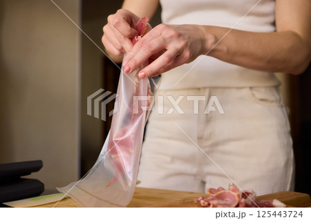 Using Vacuum Sealing Techniques for Enhancing Meat Freshness, Storage, and Preservation Benefits 125443724
