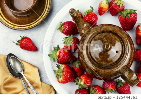 Fresh summer tea with strawberries. Fresh summer tea with strawberries. 125444363