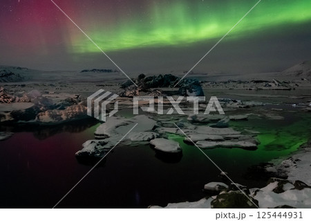 Aurora Borealis over Island Aurora Borealis over Island 125444931