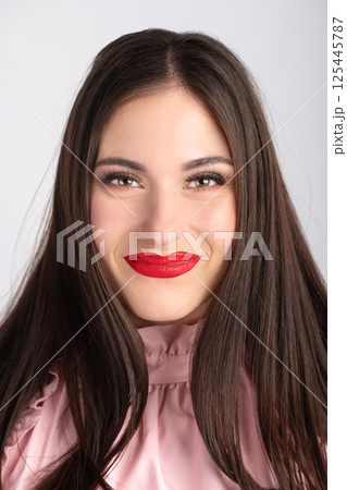 Close-up beautiful woman with red lips portrait 125445787