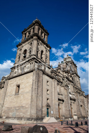 Facade of the historical Metropolitan Cathedral of Mexico City built between 1573 and 1813. Metropolitan Cathedral of the Assumption of the Most Blessed Virgin Mary into Heaven. 125445827