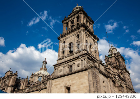 Facade of the historical Metropolitan Cathedral of Mexico City built between 1573 and 1813. Metropolitan Cathedral of the Assumption of the Most Blessed Virgin Mary into Heaven. 125445830