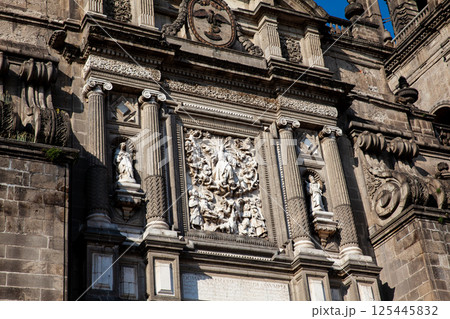 Facade of the historical Metropolitan Cathedral of Mexico City built between 1573 and 1813. Metropolitan Cathedral of the Assumption of the Most Blessed Virgin Mary into Heaven. Facade of the historical Metropolitan Cathedral of Mexico City built between 1573 and 1813. Metropolitan Cathedral of the Assumption of the Most Blessed Virgin Mary into Heaven. 125445832